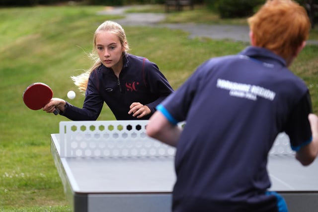 Young table tennis stars Mia Longman and Louis Fell play