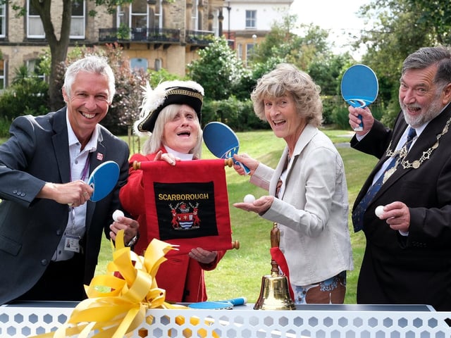 Cllr Rich Maw, Town Criers Consort Veronica Dickinson, organiser Jane Leigh and  and Mayor Eric Broadbent try out the new table