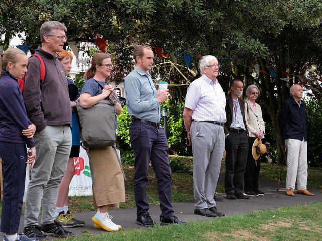 Guests take in the action at the opening
