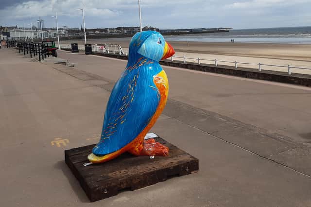 The Puffins Galore! sculpture on Bridlington’s southside is the focus of Leeds visitor Paul Walker.