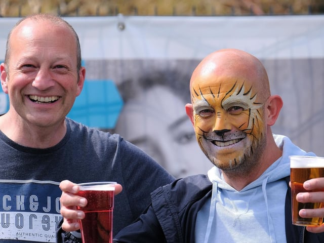 Cheers to the fans as they return to watch football at the Legends match