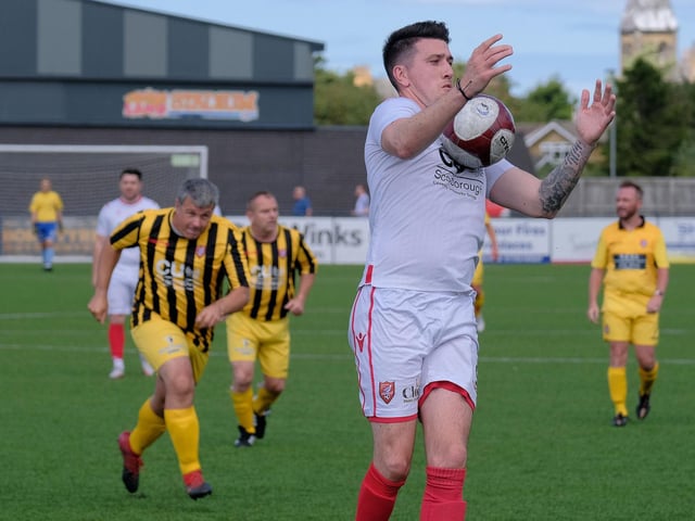 Scarborough Athletic Legend Scott Phillips gets the ball under conrol