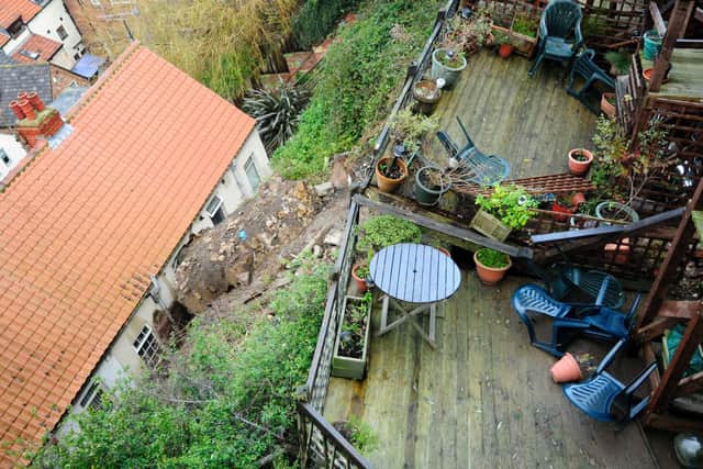 The landslide impacted properties below the slip.