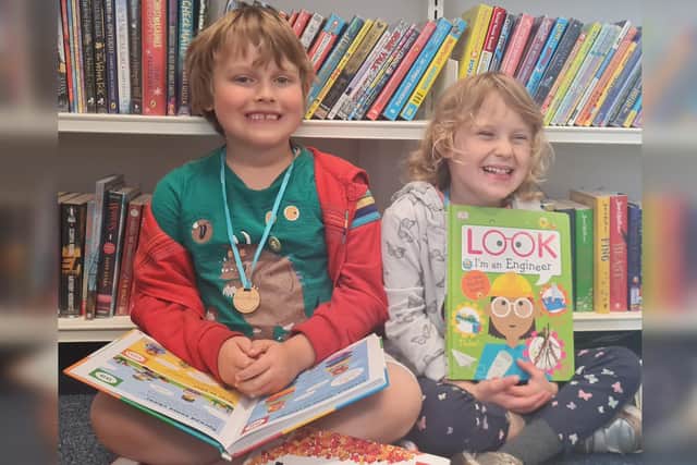 Young readers John Robert and Josie are ready for the challenge.