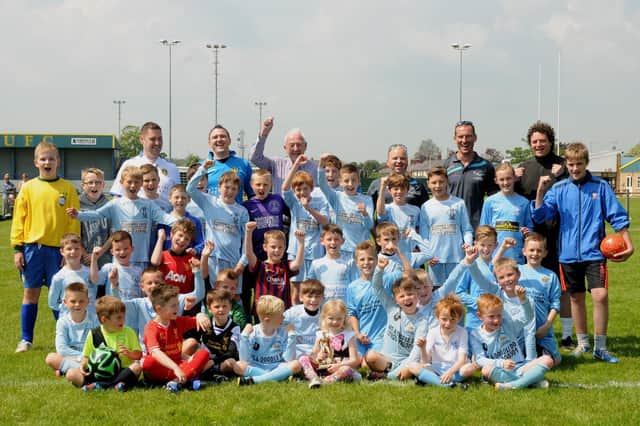 Bridlington Rangers juniors players line up to celebrate 25 years as a club in 2004