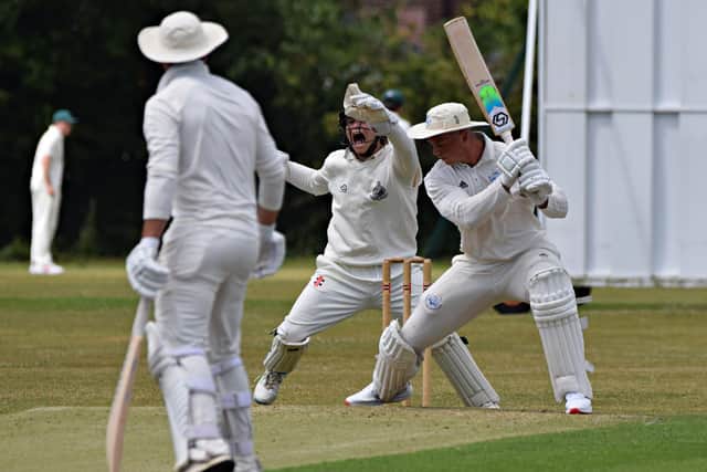 Scarborough Keeper Duncan Brown takes a great catch to dismiss Christie
PHOTOS BY SIMON DOBSON