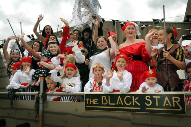 Cayton Gala gets underway. Pictured are the pirates on board the float The Black Star.