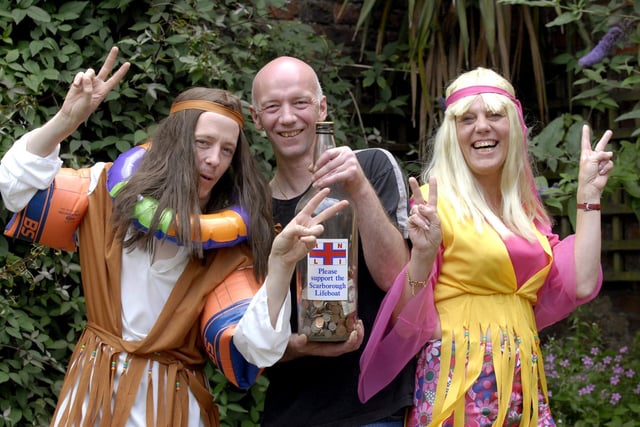 Pub managers Mick Blake, left, and Tracy Mason, are raising money for Scarborough Lifeboat by doing the famous pier jump dressed in 70s gear. They are pictured with Matt Coulson who owns the Tap 'n' Spile and New Tavern.