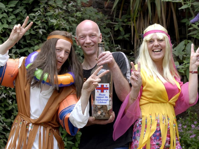 Pub managers Mick Blake, left, and Tracy Mason, are raising money for Scarborough Lifeboat by doing the famous pier jump dressed in 70s gear. They are pictured with Matt Coulson who owns the Tap 'n' Spile and New Tavern.