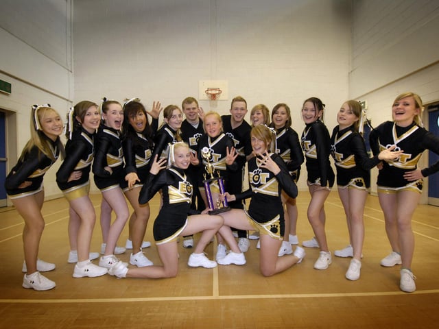 The East Coast Tigers cheerleader team celebrate winning fourth in a national competition. The team is led by Jess Mortimer, front right, and trains at the Gallows Close Community Centre.