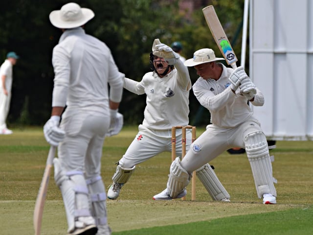 Scarborough keeper Duncan Brown takes a great catch to dismiss Christie