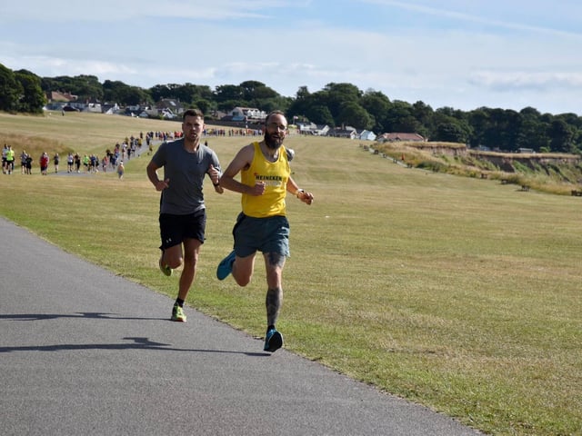 Bridlington Road Runner Phill Taylor, right, earned second spot