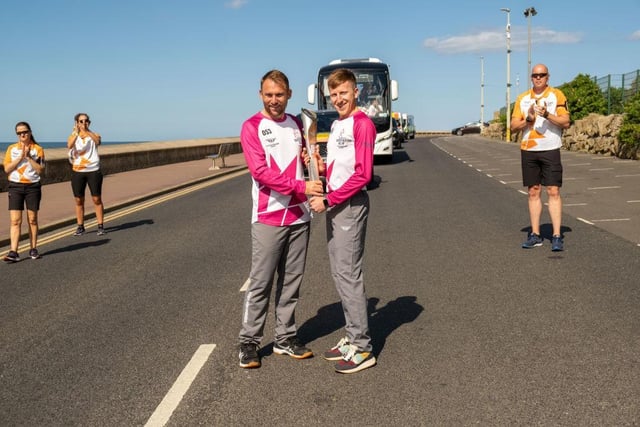 Carl Hazel and Josh Beasley-Hall deliver the baton into North Bay.