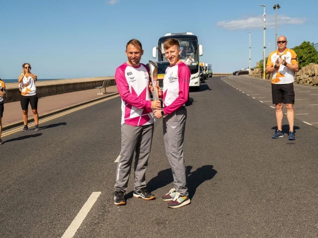 Carl Hazel and Josh Beasley-Hall deliver the baton into North Bay.