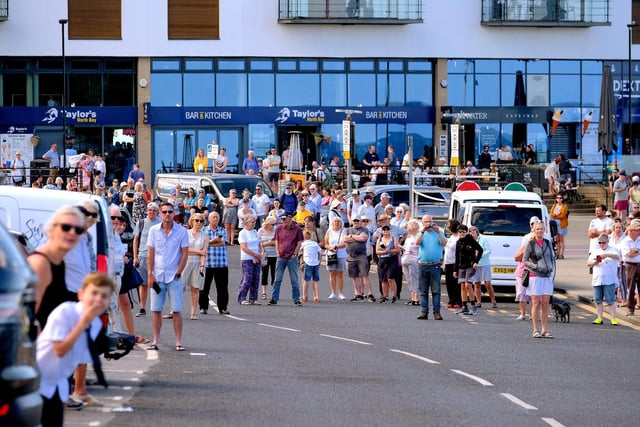 Crowds eagerly wait for the baton to arrive in North Bay.