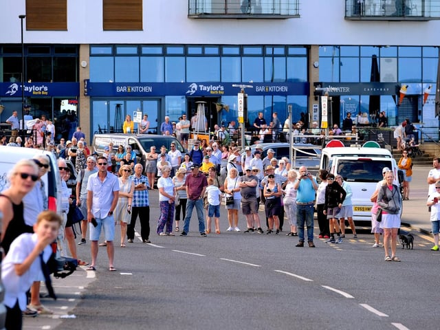 Crowds eagerly wait for the baton to arrive in North Bay.