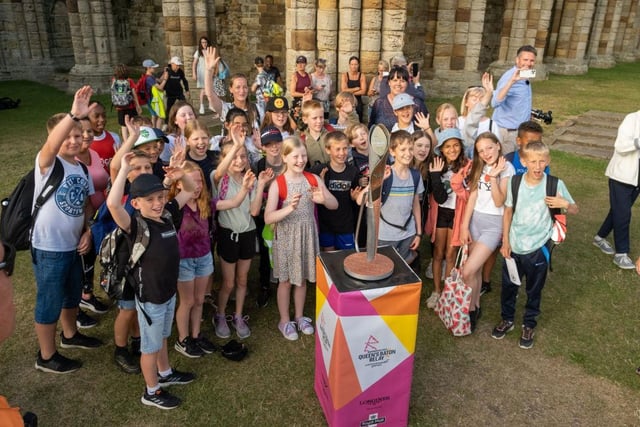 The Queen's Baton Relay visits Whitby Abbey.