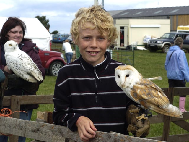 At Sneaton and Hawsker Show Luke Halley from Whitby holds Barney the barn owl.