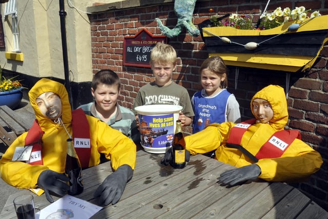 At the Scarecrow Festival in Muston on the RNLI stall were Harry Walker, Jordan Healy and Ashlynn Healy.