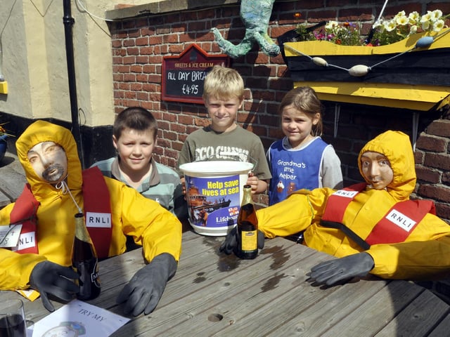 At the Scarecrow Festival in Muston on the RNLI stall were Harry Walker, Jordan Healy and Ashlynn Healy.