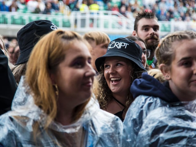 The rain didn't dampen the smiles