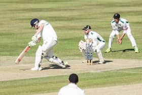Tom Norman struck a magnificent century for Flixton