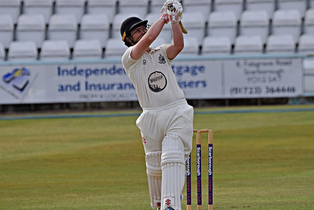 Scarborough batter Duncan Brown hits out during his magnificent 115