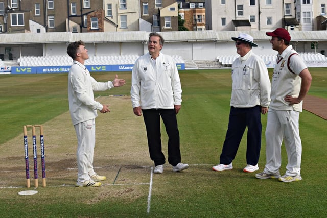 The skippers and umpires at the Harburn Cup final coin-toss