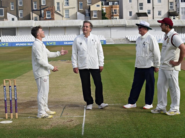 The skippers and umpires at the Harburn Cup final coin-toss