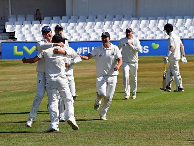 Scarborough CC celebrate taking a wicket
