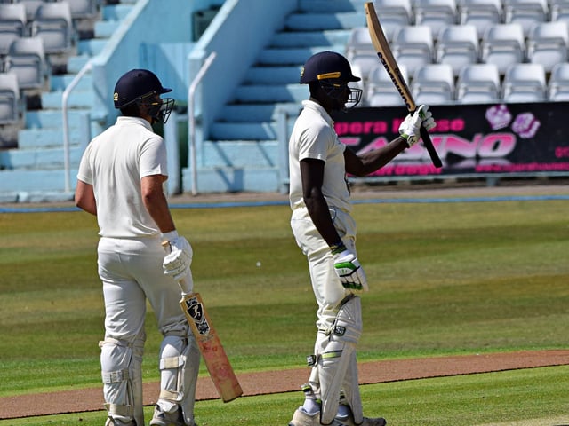 Scarborough's Romario Roach reaches his fifty