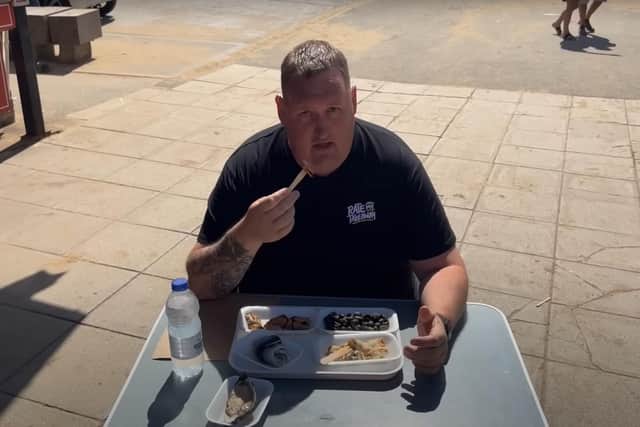 Rate My Takeaway YouTube star Danny Malin at Mick Grime Shellfish. (Photo: Rate My Takeaway/YouTube)
