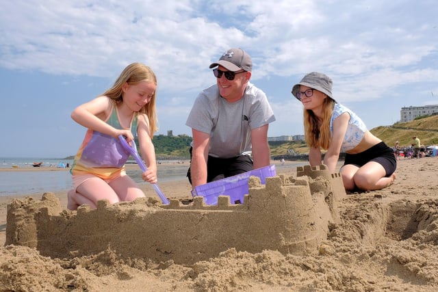 Camryn, Dad Andrew and Brogan build Scarborough Castle on North Bay.