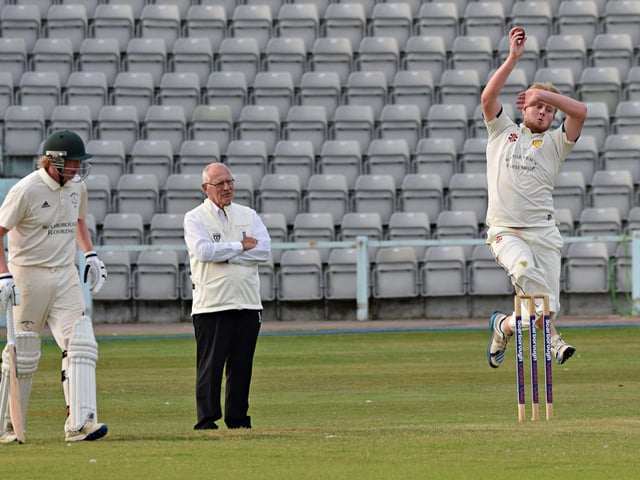 Ganton bowler Matthew Atkinson from the Peasholm End