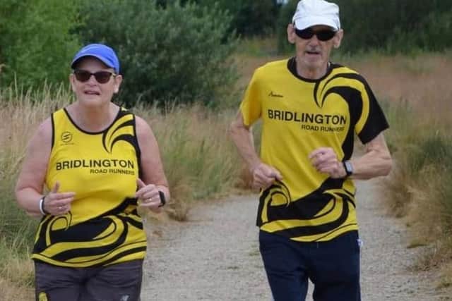 Bridlington Road Runners' Tina Calthorpe, left, runs her 350th Parkrun, alongside husband Rob
