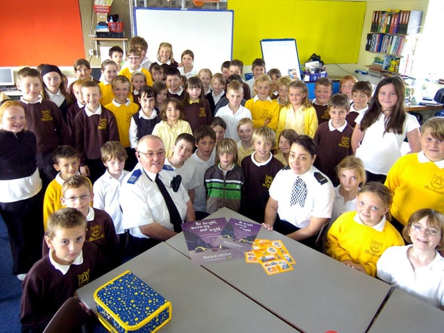 PC Alison Fenton, youth action officer, and PCSO for the West Cliff area Ian Rowley talk to schoolchildren about staying safe over the the summer holiday.
