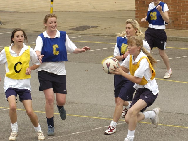 Students compete in a netball match at Whitby Community College's sports day.