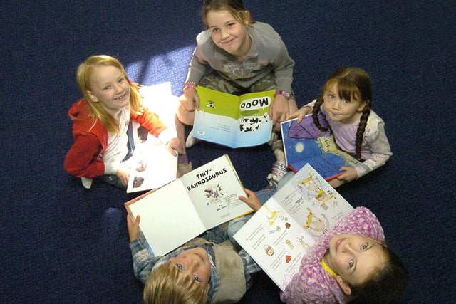 Children from Danby Primary School use the mobile library service as part of the Book Start Week.