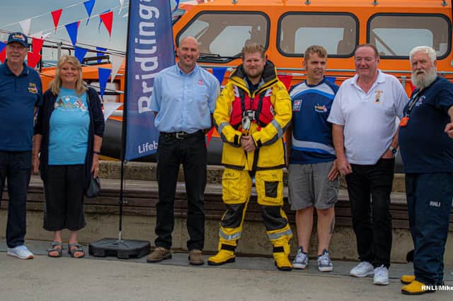 Buddies for Boats members are pictured with Bridlington RNLI volunteer Jason Stephenson. Photo: Mike Milner/RNLI