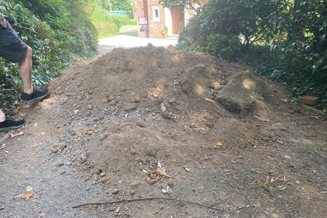 The waste completely blocked the driveway