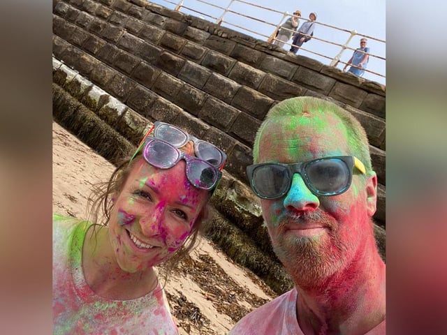 A colourful smile for the camera.