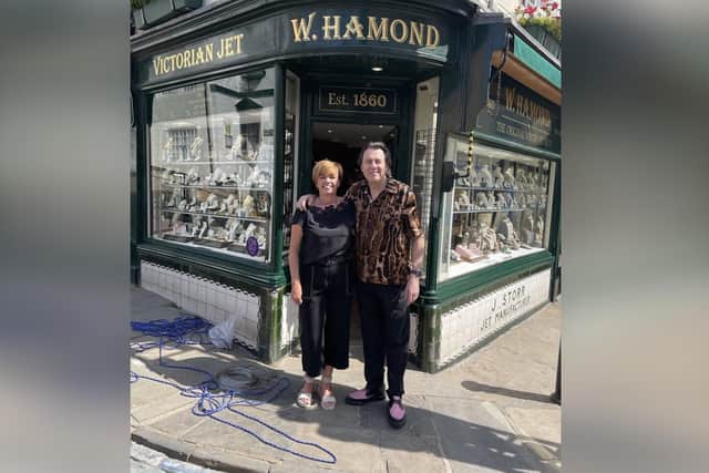 Tv celebrity Jonathan Ross poses for a picture with Sally Robinson, manager at W Hamond jewellers on Church Street.