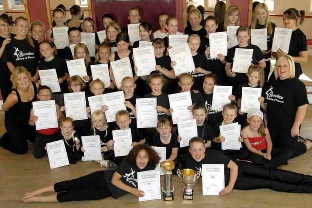 Performers from the Rowlies Academy of Dance are all smiles after gaining their certificates at the YMCA.