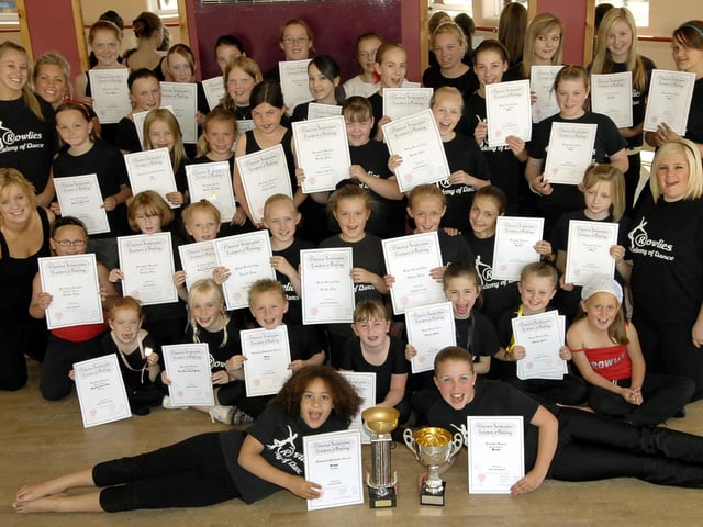 Performers from the Rowlies Academy of Dance are all smiles after gaining their certificates at the YMCA.
