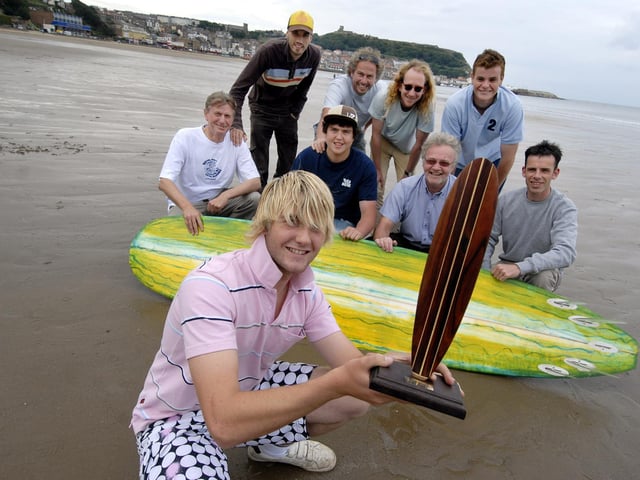 Scarborough Malibu Surf Club team who have come second in the national longboard surf championships. From left, back, Ian Kirk, Mark Dickinson, Stuart Cross, Steve Crawford and James Kirk. Middle, Tom Cross, Phil Thacker and Kevin Anderson. Front, Ryan Hammond, with the trophy.