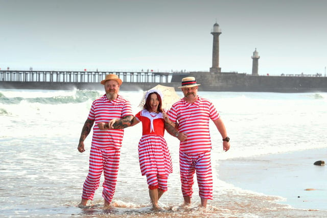 Splashing in the water, pictured from the left are Mark Worley, Dawn Moss and Neil Perry.