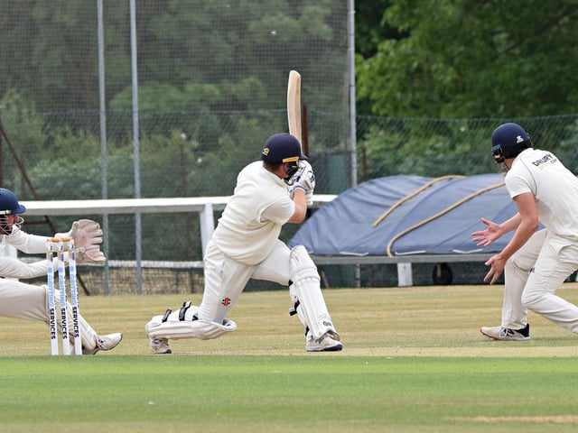 Scarborough batter Ed Hopper sweeps for four runs