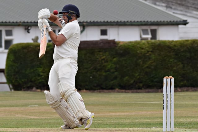 Scarborough all-rounder Linden Gray fends off a short pitched delivery