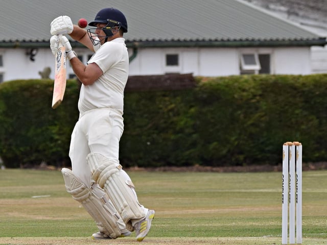 Scarborough all-rounder Linden Gray fends off a short pitched delivery