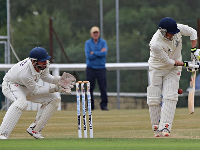 Adam Newington attempts a leg-glance